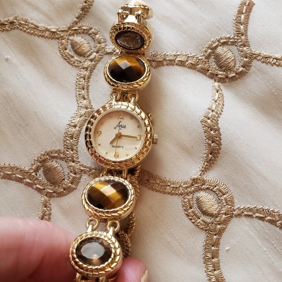 Aria Goldtone bracelet watch with tiger eye, smoky quartz and milky quartz gems - Picture 7 of 8